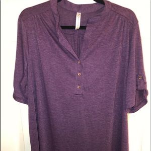 Purple shirt sleeve top with Gold buttons